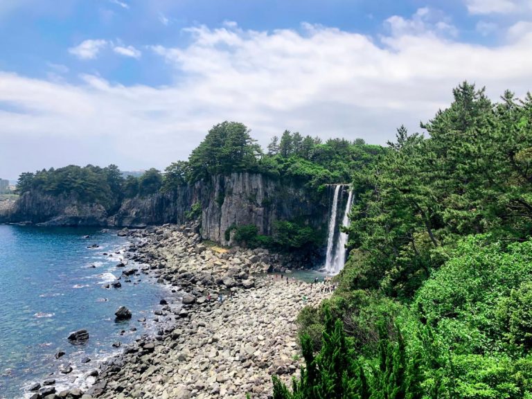Jeongbang Waterfall – Jeju’s Rare Ocean-Flowing Waterfall of Coastal Beauty, Cliffside Power, and Natural Harmony